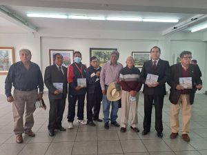 Pintores junto al regidor Carlos Sanchez. Foto: HBA Noticias